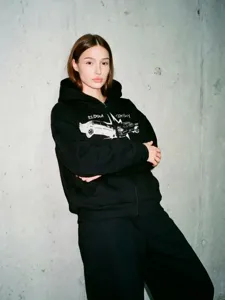 Sweat zippé à capuche graphique rétro, veste streetwear ample et décontractée pour homme femme.