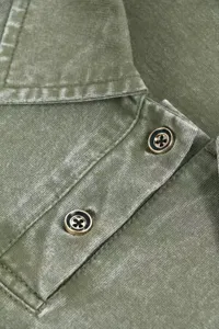 Close-up detail of vintage washed green polo collar and chic metal-trimmed buttons.