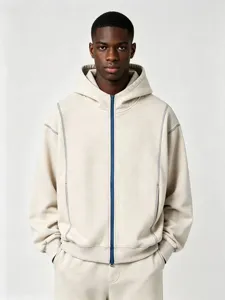 Men's stylish casual zip-up hooded sweatshirt with contrast blue zipper and stitching details.