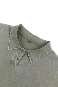 Detailed shot of the washed heavy short-sleeve polo collar shirt showing fabric and buttons.