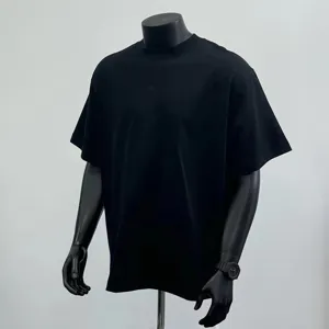 Detailed view of solid black heavy drop-shoulder crewneck t-shirt, casual streetwear style.