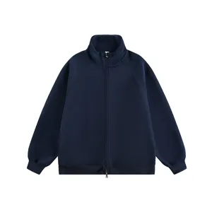Detail view of heavyweight navy blue zip-up cardigan hoodie, fine fabric texture.
