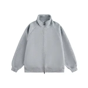 Detail view of grey full-zip stand collar sweatshirt, premium heavy fabric basic hoodie.