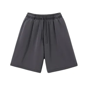 Men's retro washed casual shorts detail, loose fit distressed five-quarter pants design.