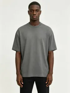 Charcoal grey oversized short sleeve t-shirt detail showing boxy fit and washed fabric.