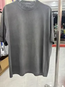 Vintage washed oversized short sleeve t-shirt for men, casual dark grey distressed streetwear top.