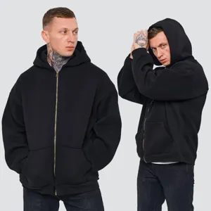Detailed view of the heavy black full-zip hoodie, featuring a metal zipper and hood.