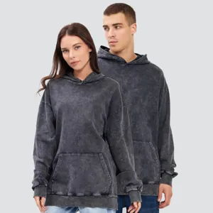 Detail view of the heavy washed vintage grey hoodie with front pocket and comfortable fit.
