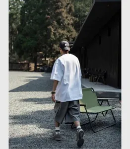 Heavyweight cotton plain white t-shirt, relaxed drop-shoulder fit for casual everyday wear.