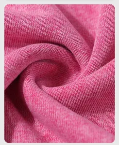 Pink hoodie sweatshirt fabric texture close up soft knitted cotton material detail view