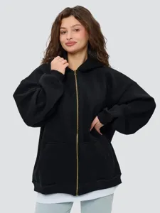 Oversized black zip-up hoodie for women, heavy cotton blend casual streetwear jacket with hood and pockets.