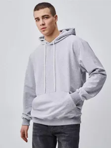 Details of the heavy solid color fleece hoodie, cozy hood with drawstring and front pocket.