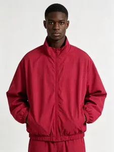 Men's red plaid stand collar zip-up windbreaker jacket detail view, casual streetwear.