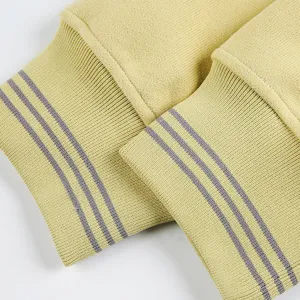 Ribbed cuff detail of casual sweatshirt, soft knit fabric with stylish striped pattern.