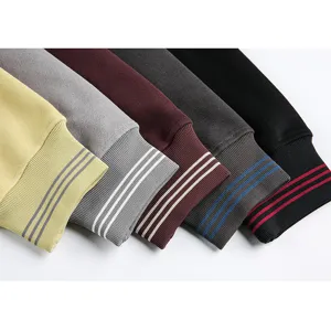 Casual sweatshirt sleeve cuff detail showcasing comfortable ribbed fabric in multiple vibrant colors.