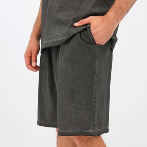Vintage washed cotton casual shorts detail featuring gradient texture and loose relaxed fit style