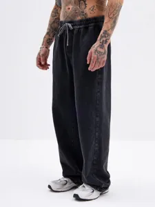 Vintage washed straight-leg sweatpants detail with adjustable drawstring waist and casual fit.
