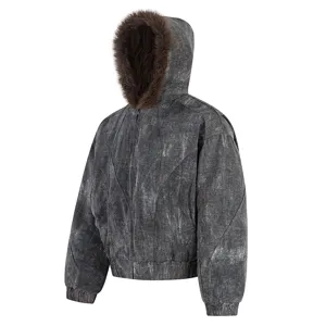 Distressed gray winter hooded jacket detail showing textured fabric and brown fur lining.