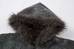 Winter men's thickened cotton-padded jacket detail shot with faux fur hood and vintage washed gray fabric.