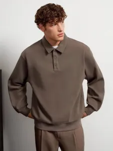 Men's solid color long-sleeve polo sweatshirt with lapel collar, casual autumn winter apparel.