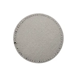 Grey circular tactical morale patch with white stitched edge, ideal for backpacks and caps.