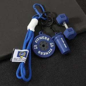 Llavero de fitness azul de PVC goma suave mancuerna placa de peso para bolso