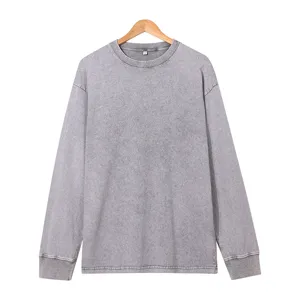 Vintage washed grey long sleeve t-shirt, relaxed fit detail view, textured fabric.