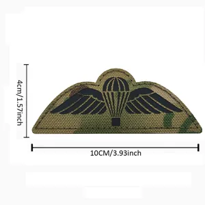 Military tactical morale patch with paratrooper wings design, durable camo fabric badge.