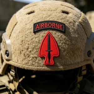 Detailed close-up of AIRBORNE tactical embroidered patch with red arrowhead design.