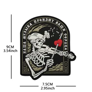 Tactical PVC morale patch featuring a skeleton playing violin with red heart design and dimensions.