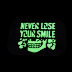 Glow in the dark tactical morale patch with skull design and inspiring quote for gear.