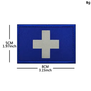 Blue medical cross embroidered patch with reflective laser engraved details, 8x5cm sizing.