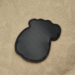 Detailed view of the black hook and loop fastener backing, showing durable tactical patch texture.