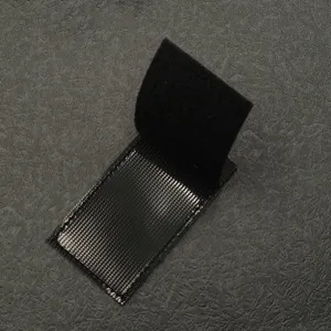 Black tactical hook and loop fastener patch base strap for military armbands and DIY use.