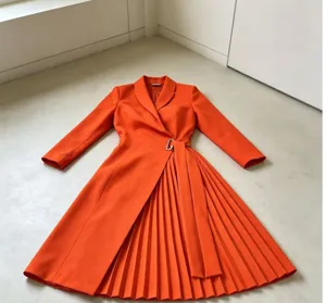 Elegant orange pleated dress with V-neck wrap waist and metal buckle detail