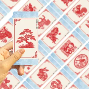 Detailed view of a traditional Chinese style paper-cut bookmark featuring elegant pine tree art.