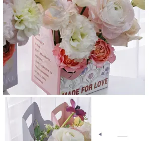 Detailansicht der romantischen tragbaren Blumenbox aus Papier mit englischem Text für Geschenke.