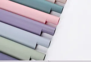 Waterproof floral wrapping paper rolls in various matte colors for Korean rose bouquets.
