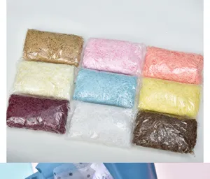 Colorful crinkle cut paper shred filler for gift box packaging and delicate party decor.