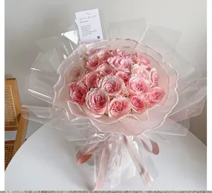 Korean style pink rose bouquet with pearl wavy mesh wrapping and elegant ribbons.