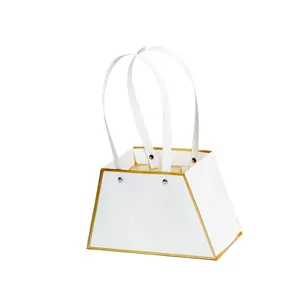 Handbediende Trapeziumvormige Bloemen Verpakkingsdoos Kraft Papier Vouwen Cadeauzak Met Lint Handvat Gouden Rand Bloemendoos