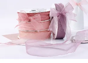 Detailed view of 2.5cm wavy edge sheer organza ribbon, ideal for gift wrapping and flower bouquet.