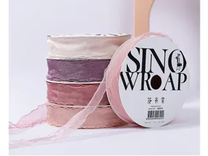 Sheer organza ribbon roll detail, wavy edge sheer ribbon for floral packaging and gift wrapping.
