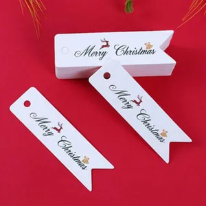 White paper Christmas gift tags with swallowtail design and holiday blessing text.
