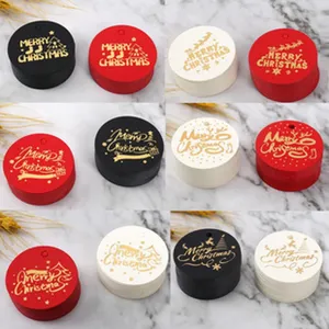 Round Christmas paper hang tags with gold foil festive prints, multi-color decorative labels.