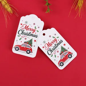 Christmas paper tags feature cute red car and tree design with holiday greeting for gift wrapping.