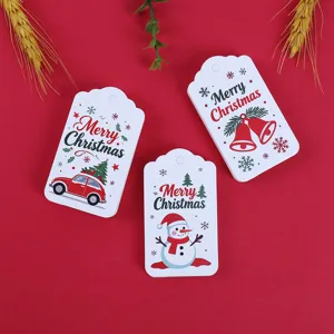 Christmas paper gift tags set, festive hanging labels with cute holiday patterns for gifts.
