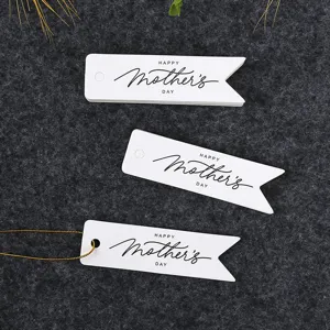 Mother's Day paper gift tags with gold string, decorative labels for holiday presents.