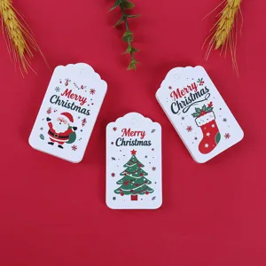 Christmas paper gift tags set featuring Santa Claus tree and stocking festive decor items.