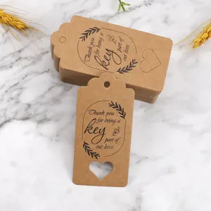 Kraft paper gift tags with hollow heart, thank you labels for party favors and wedding packing cards.